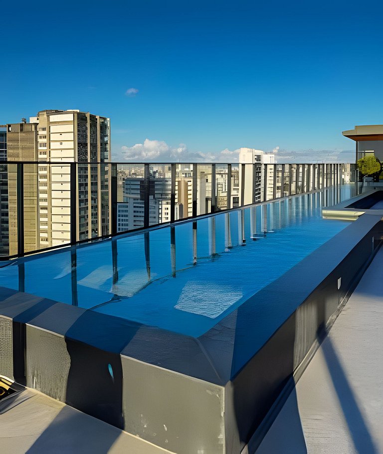 Studio c/ Rooftop e piscina vista Mar 1km da praia